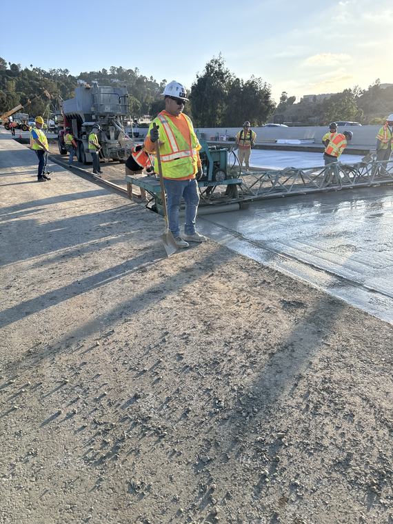 Bridge deck concrete pour at sunrise