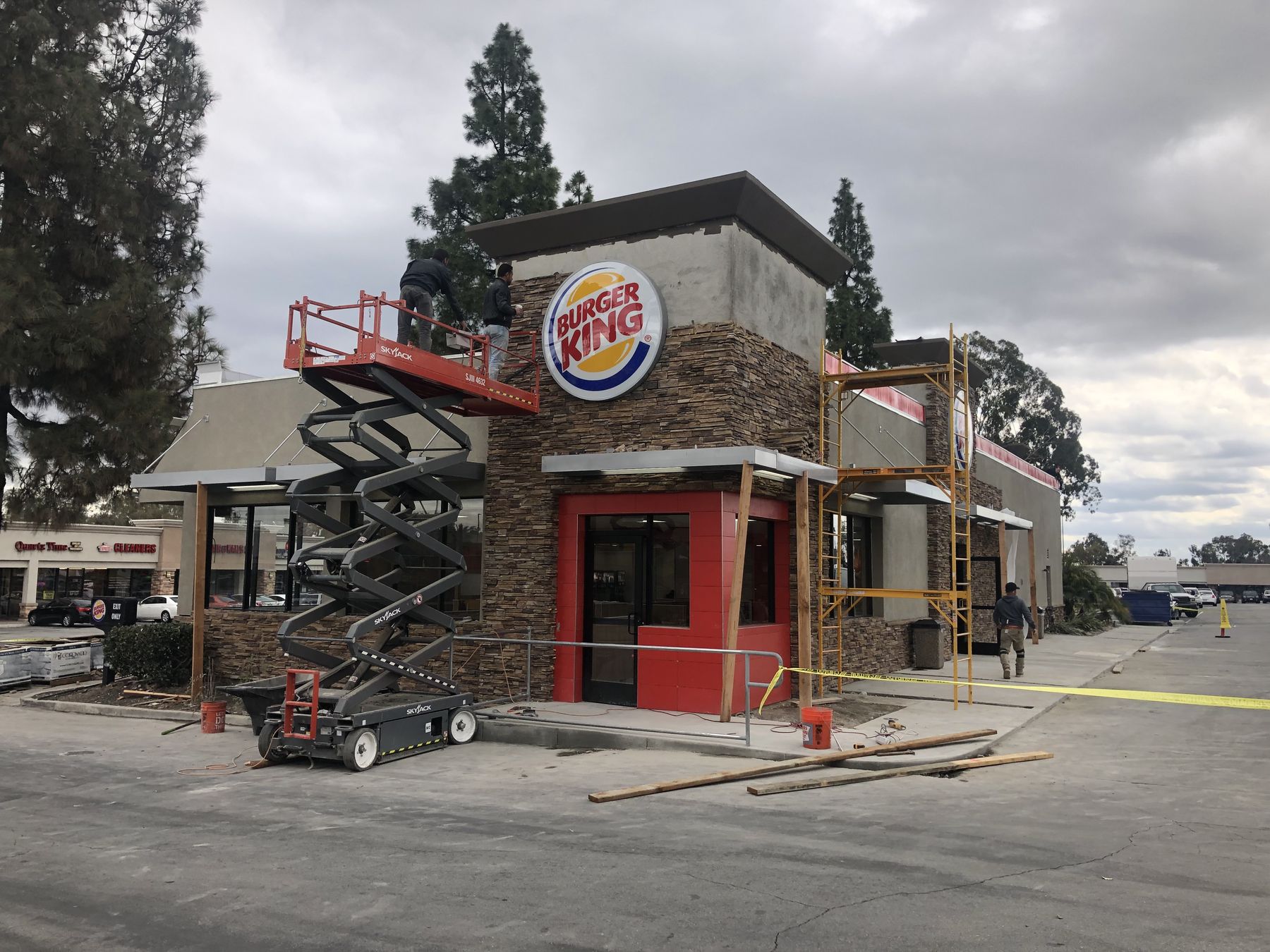 Completed restaurant with stone veneer and signage